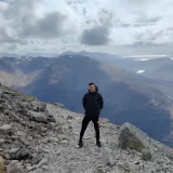 Profile photograph of Brian Ó Gallachóir standing on a mountain